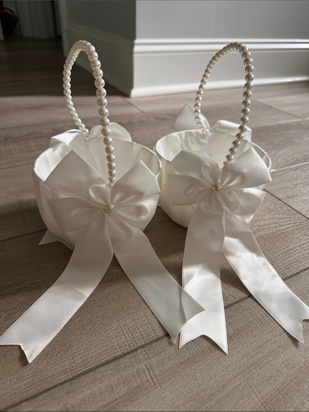 White Satin Flower Girl Baskets (2) with Imitation Beaded Pearl Detail and Bows
